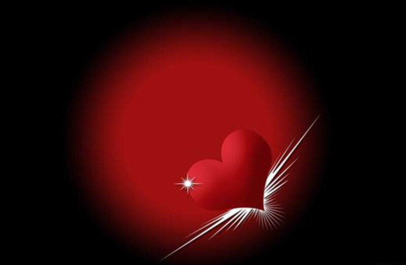 Red heart with light burst