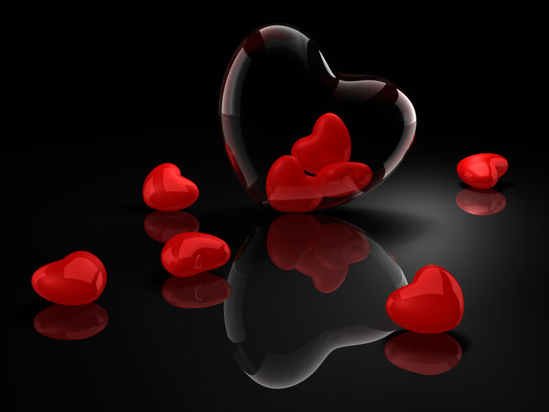 Red Hearts on Black Surface — Dramatic