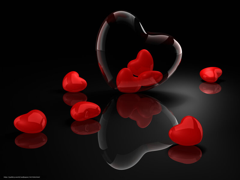 Red hearts on black surface
