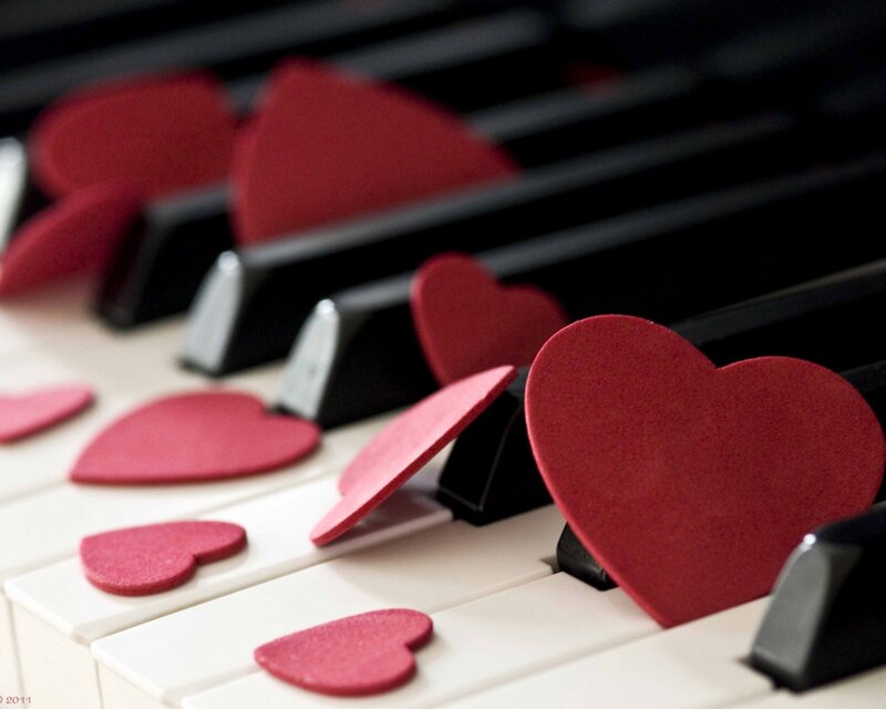 Red Hearts on Piano Keys