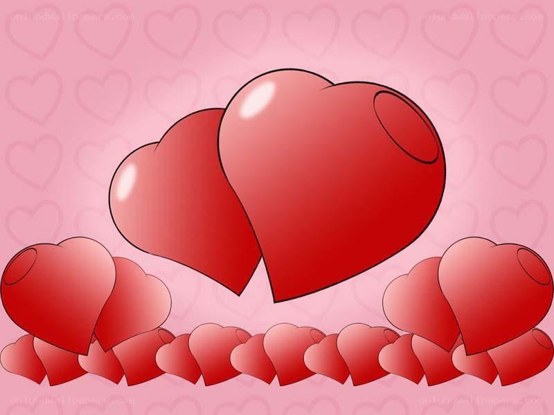 Red hearts on pink background