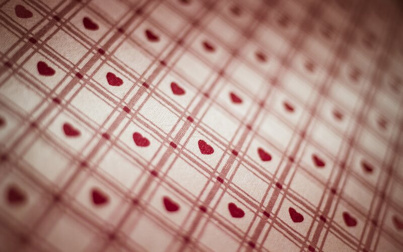 red hearts on plaid fabric
