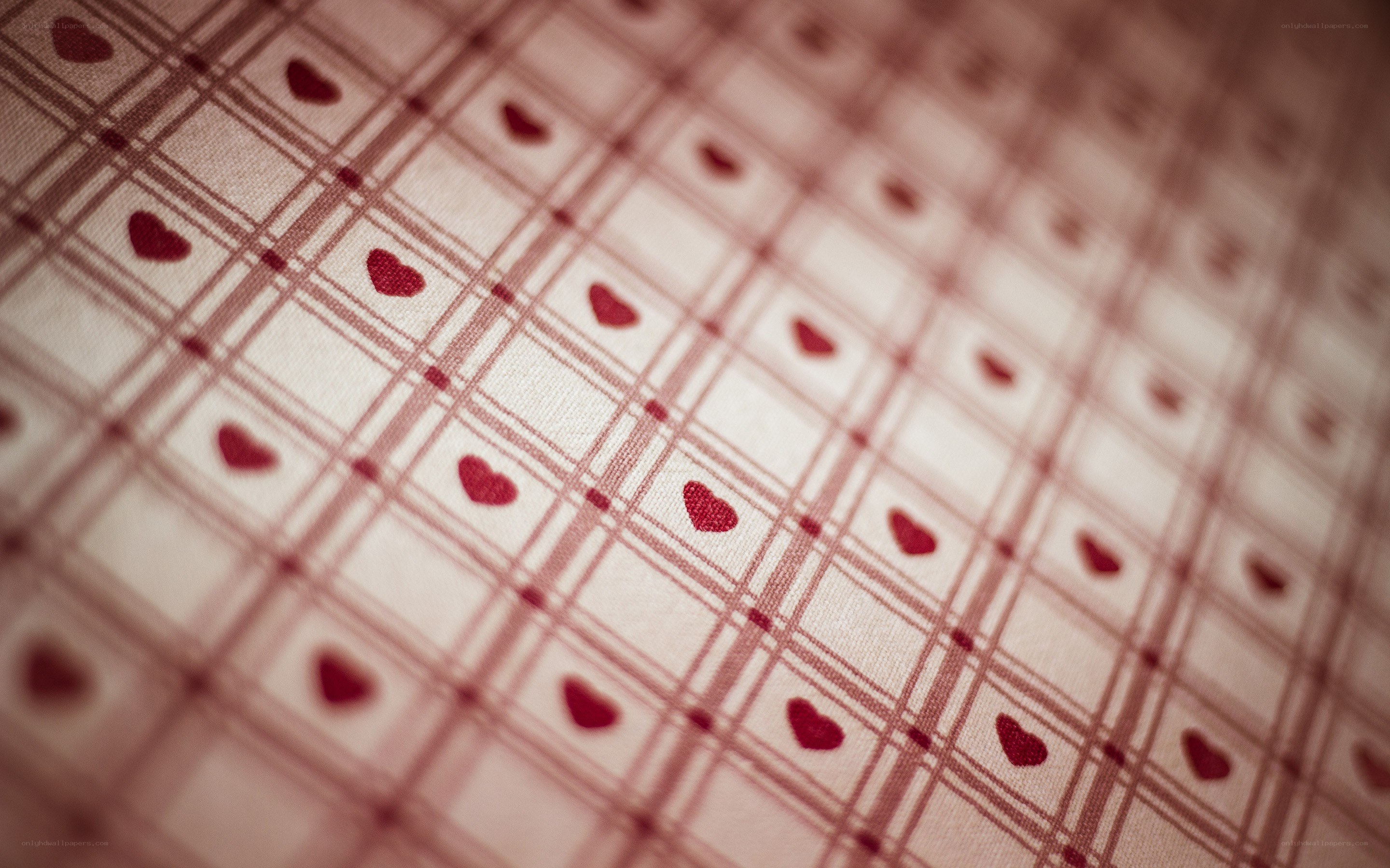 red hearts on plaid fabric