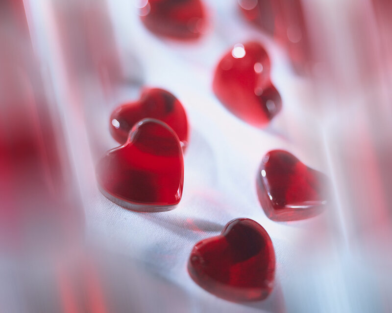 Red hearts on white fabric
