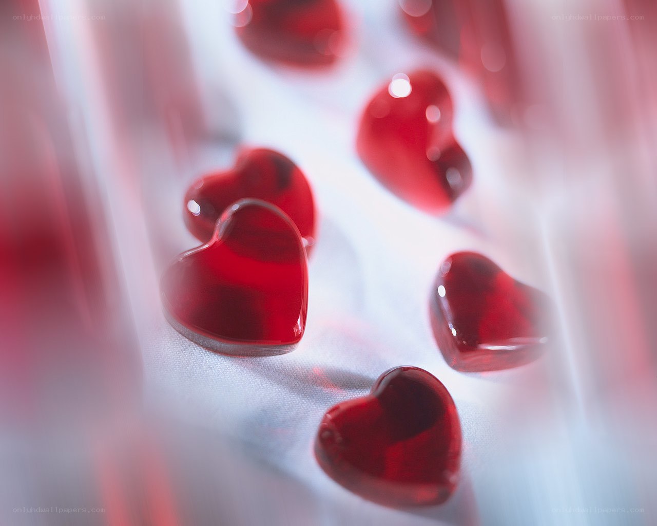 Red hearts on white fabric