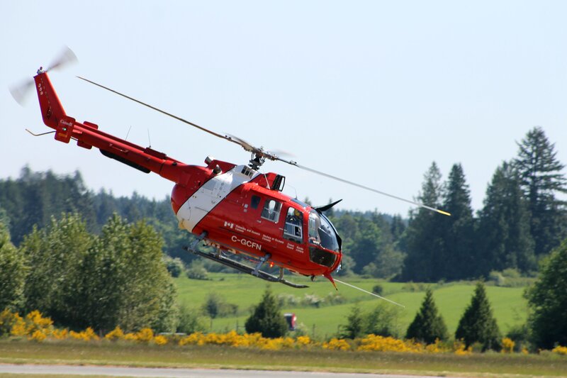 Red Helicopter in Flight — Active