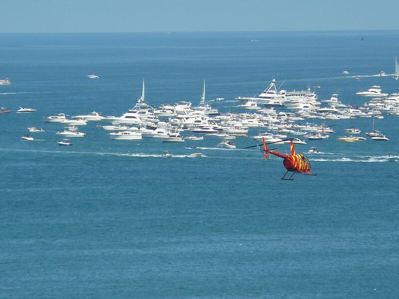 Red Helicopter over Boats