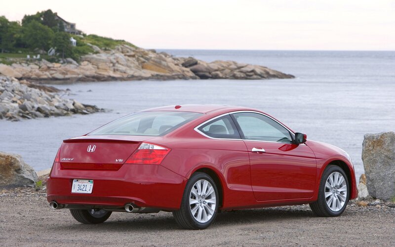 Red Honda Accord Coupe by the coast