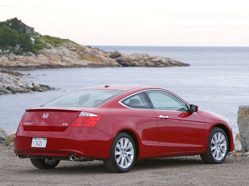 Red Honda Accord Coupe by the coast