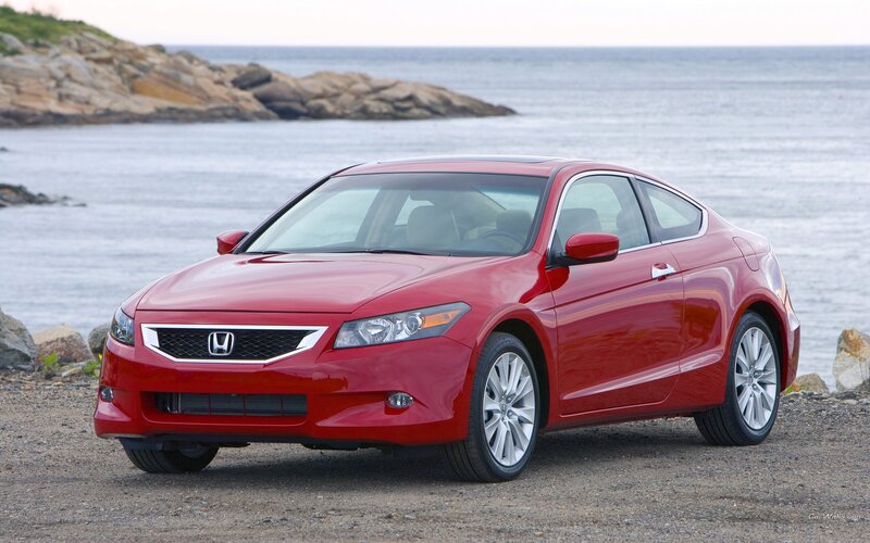 Red Honda Accord Coupe by the sea
