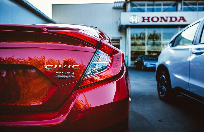 Red Honda Civic at dealership