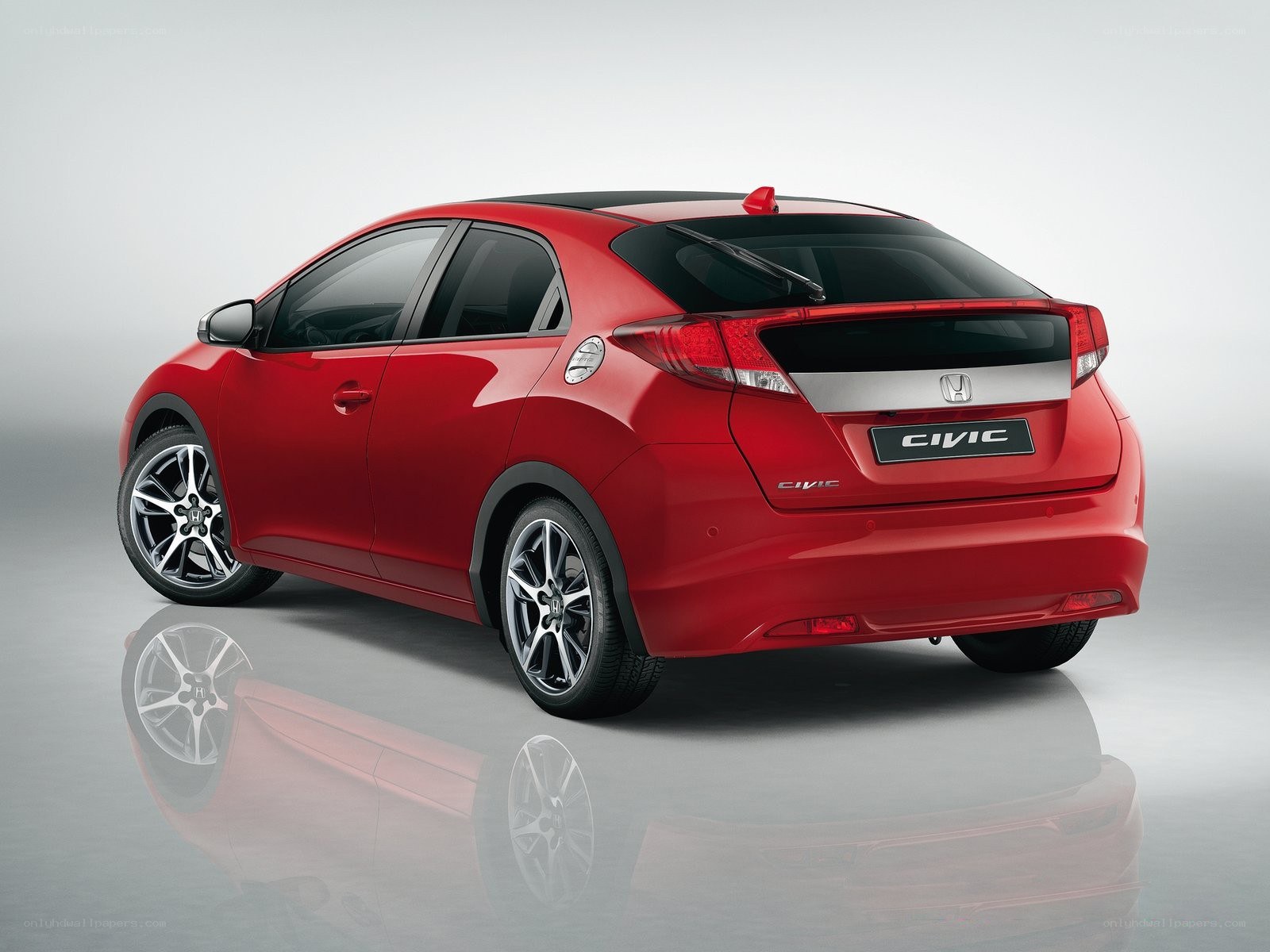 Red Honda Civic hatchback