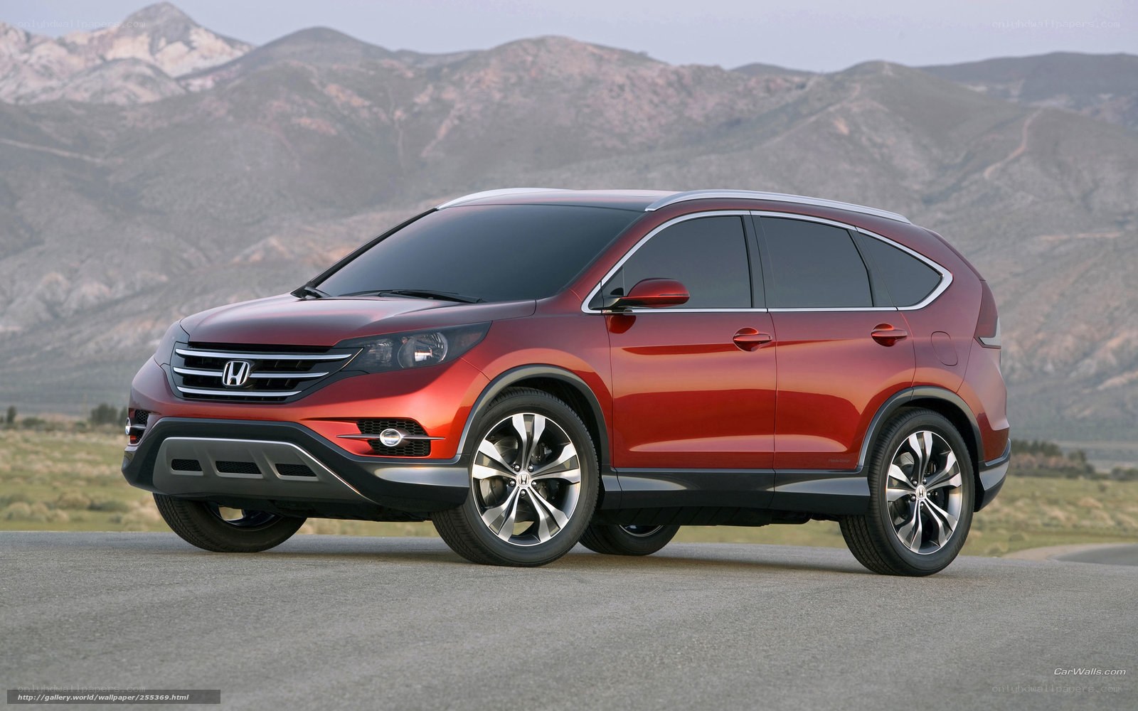 Red Honda CR-V on a road