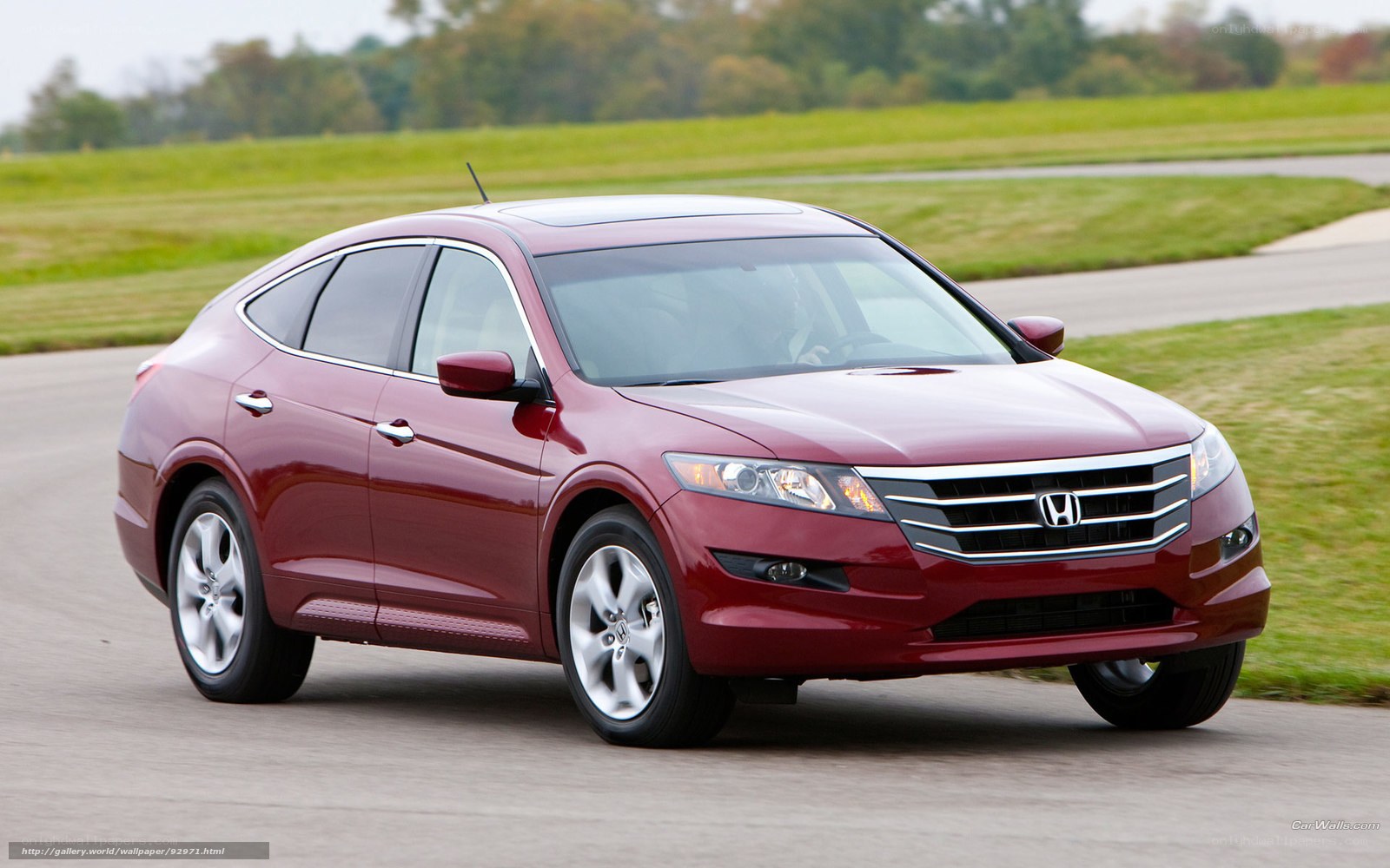 Red Honda Crosstour in motion