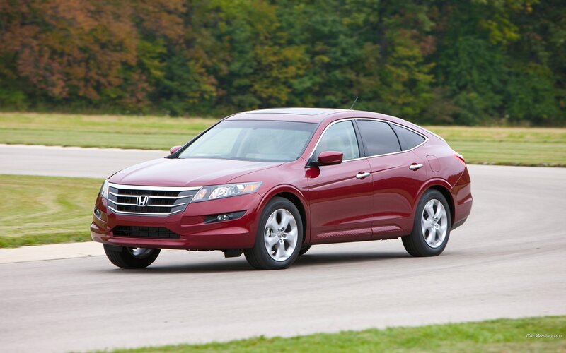 Red Honda Crosstour on a track