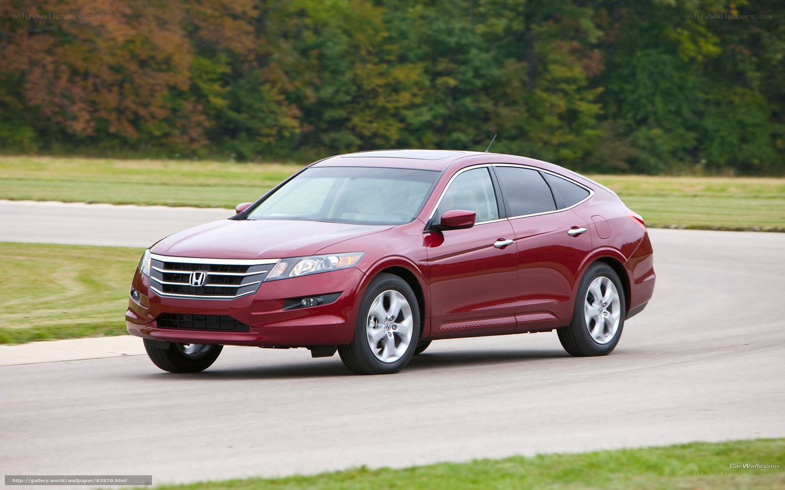 Red Honda Crosstour on road