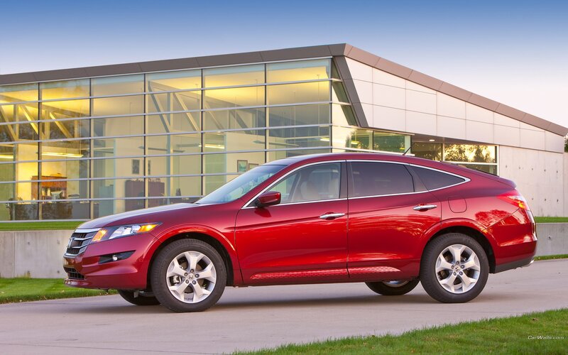 Red Honda Crosstour parked outside