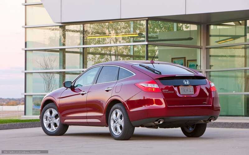 Red Honda Crosstour parked outside