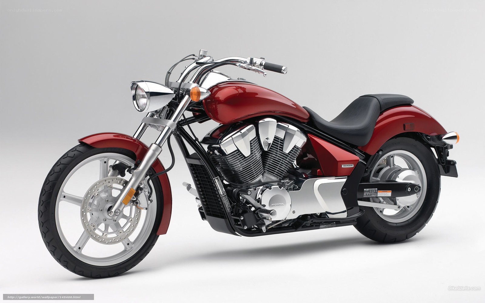 Red Honda cruiser motorcycle