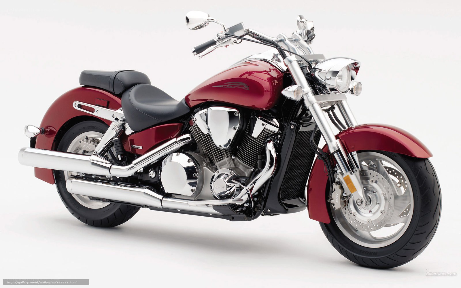 Red Honda cruiser motorcycle