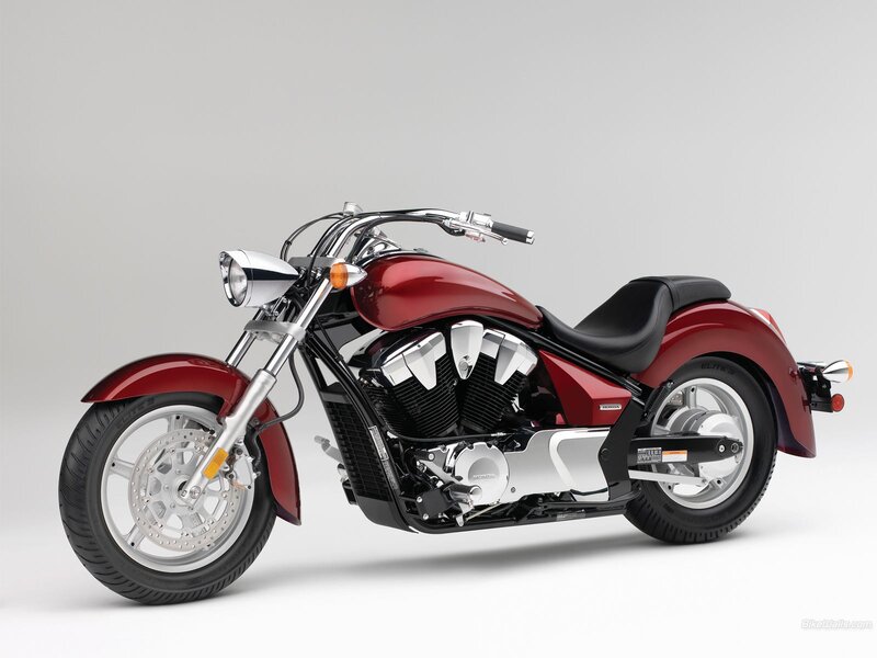red honda cruiser motorcycle