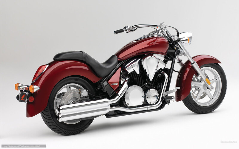 red honda cruiser motorcycle