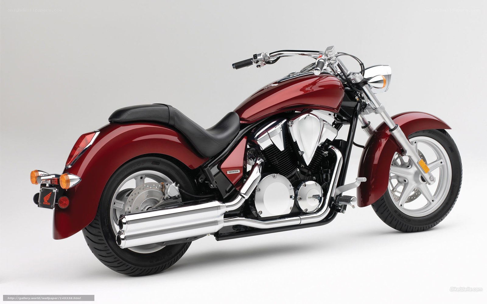 red honda cruiser motorcycle