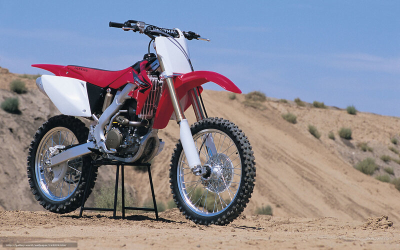 Red Honda dirt bike on stand