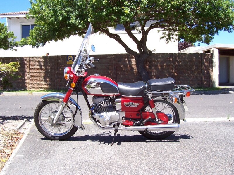 Red Honda Motorcycle — Calm, Afternoon
