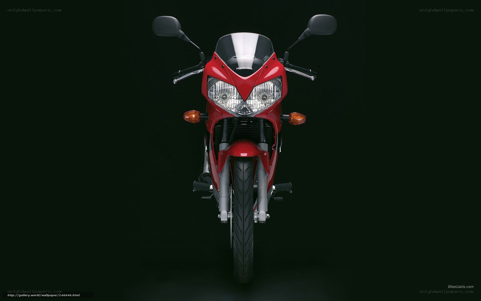 Red Honda motorcycle front view