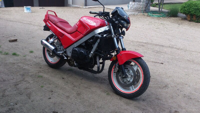 Red Honda Motorcycle — Neutral, Afternoon