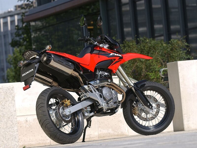 Red Honda motorcycle parked
