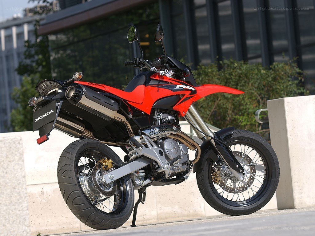 Red Honda motorcycle parked