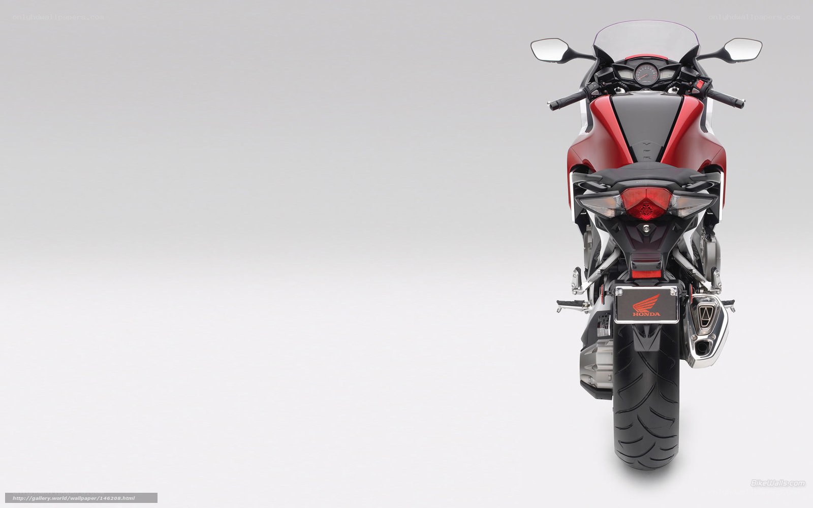 red honda motorcycle rear view