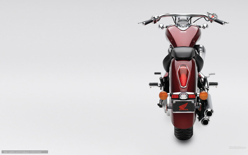 Red Honda motorcycle rear view