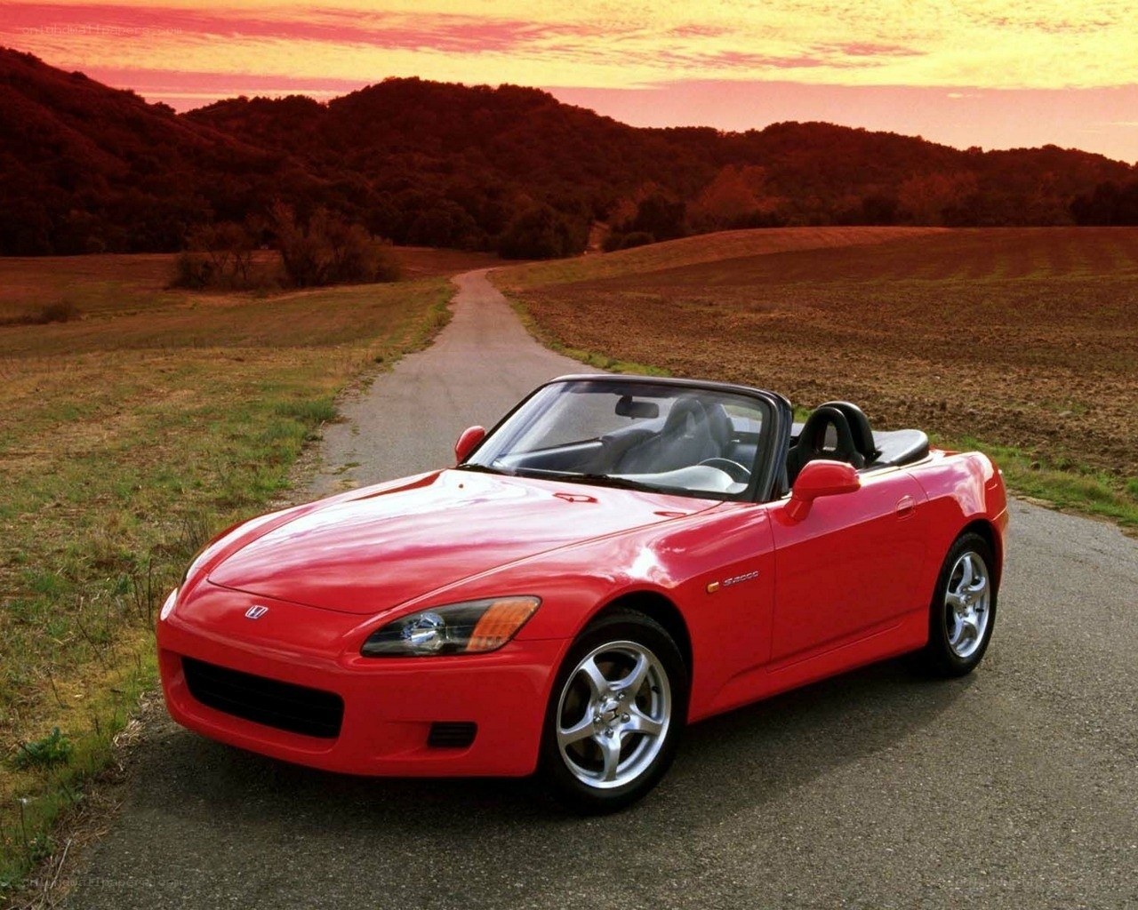Red Honda S2000 at sunset