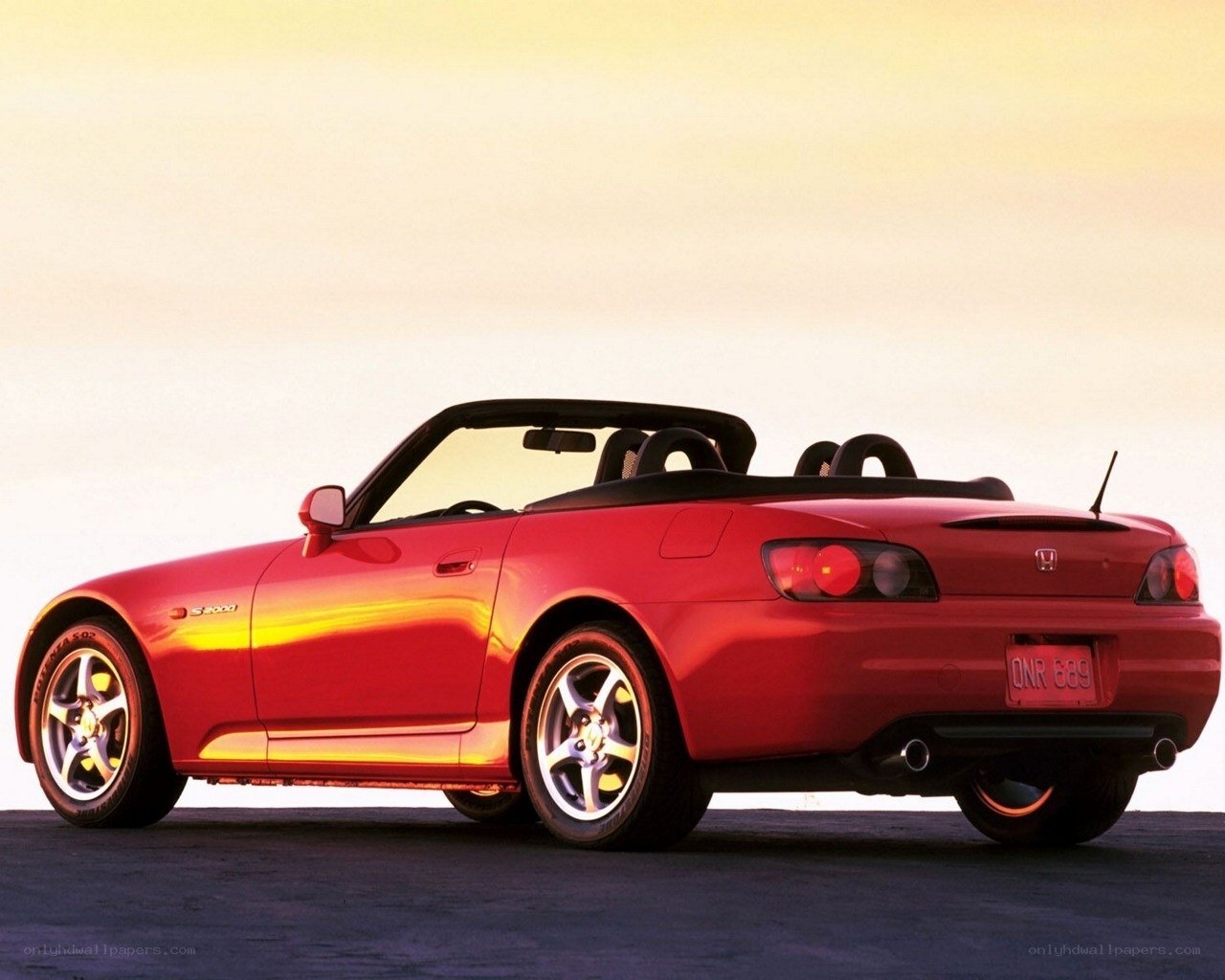 Red Honda S2000 convertible
