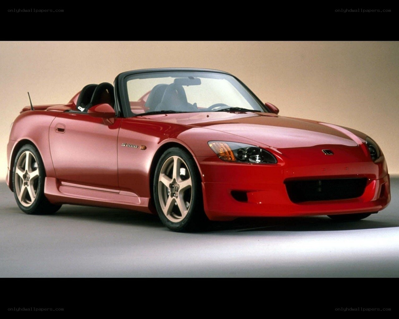 Red Honda S2000 convertible