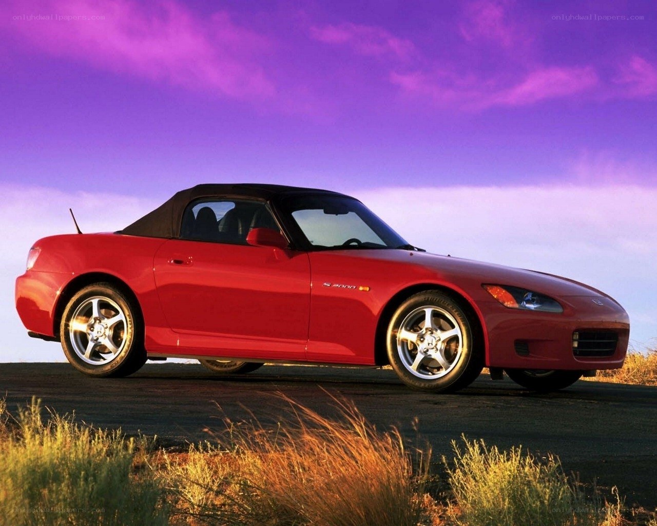 Red Honda S2000 convertible