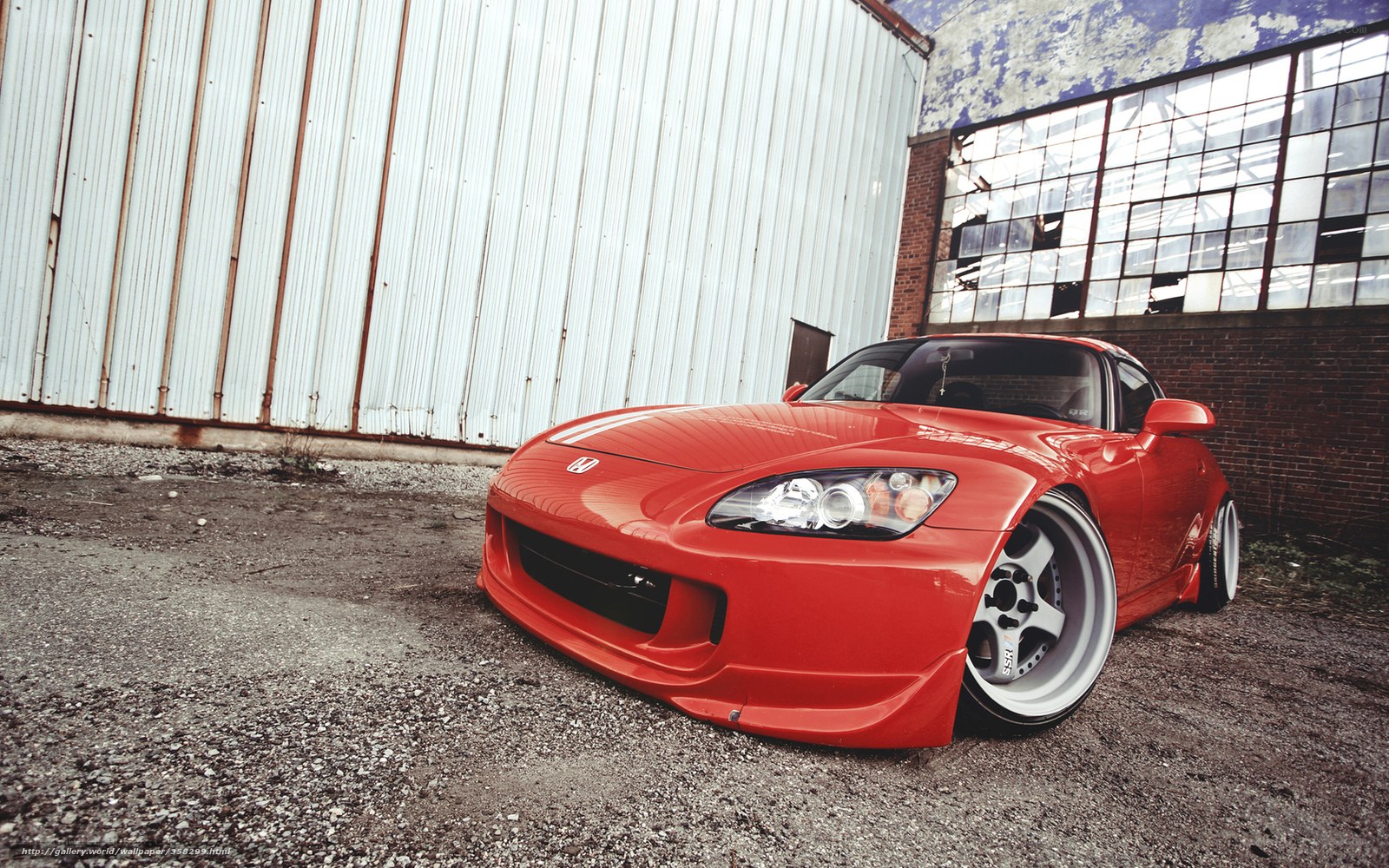 Red Honda S2000 in industrial setting