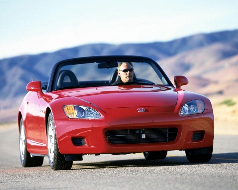 Red Honda S2000 on a desert road