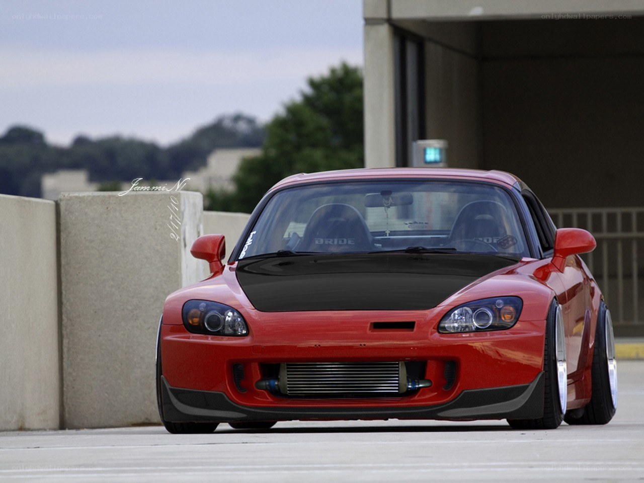 Red Honda S2000 with custom modifications