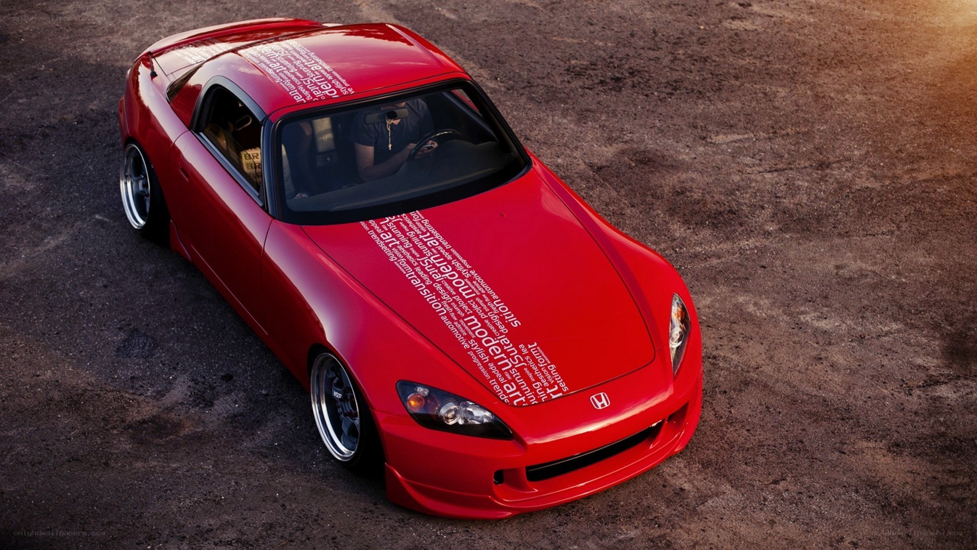Red Honda S2000 with text overlay