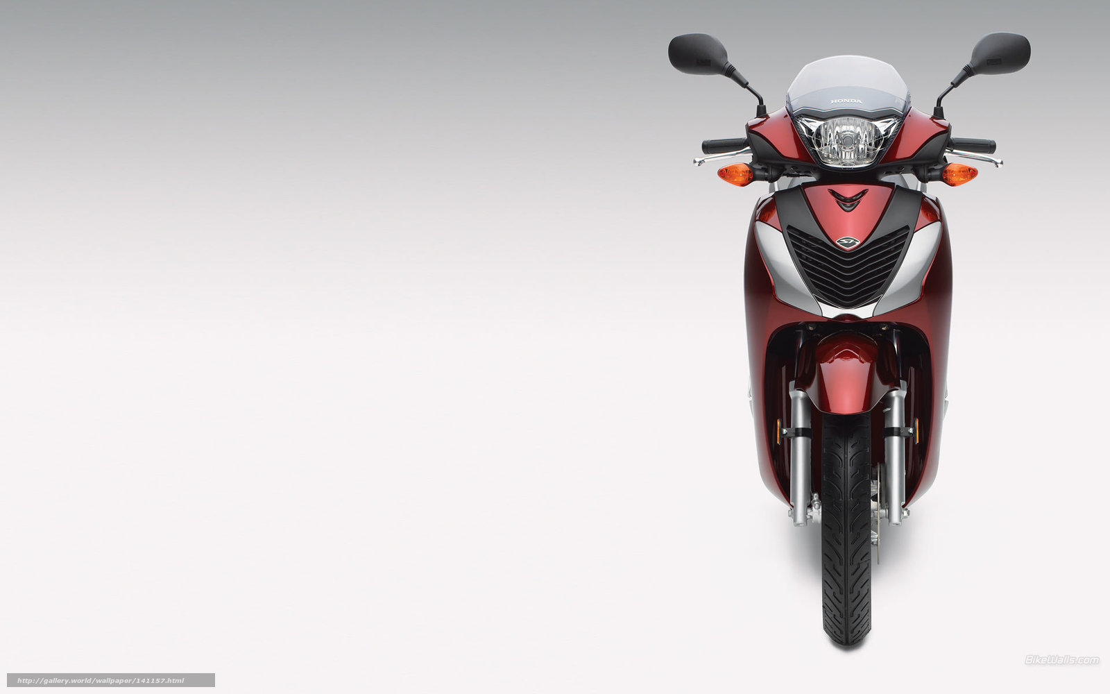 Red Honda scooter front view