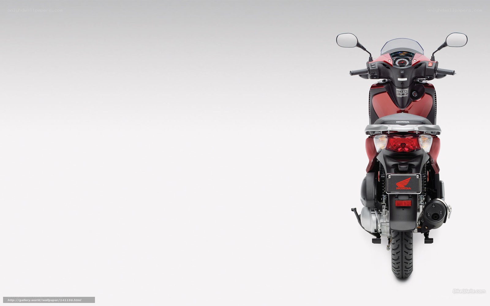 Red Honda scooter rear view