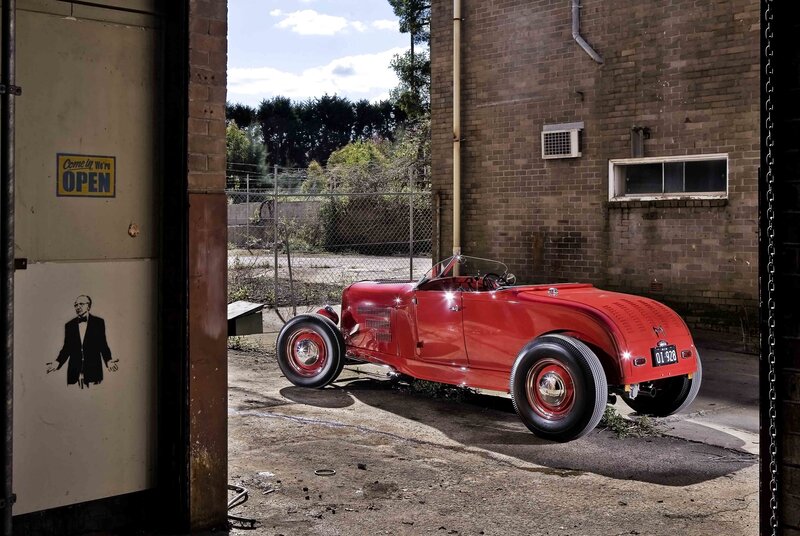 Red hot rod in alleyway