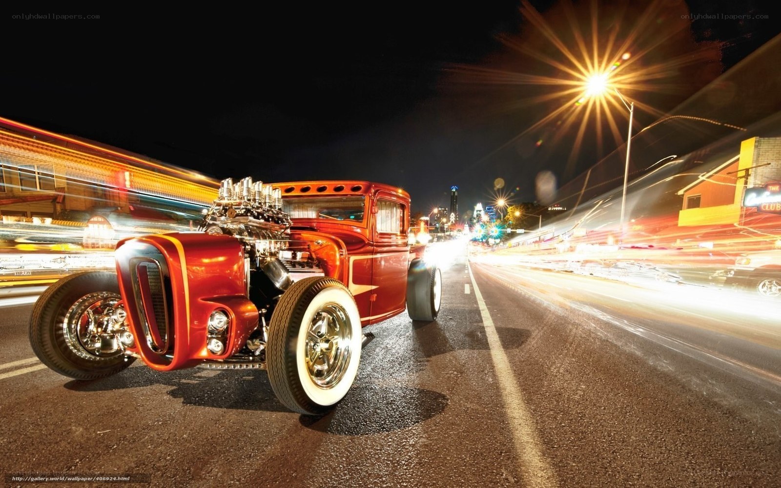 Red hot rod on city street