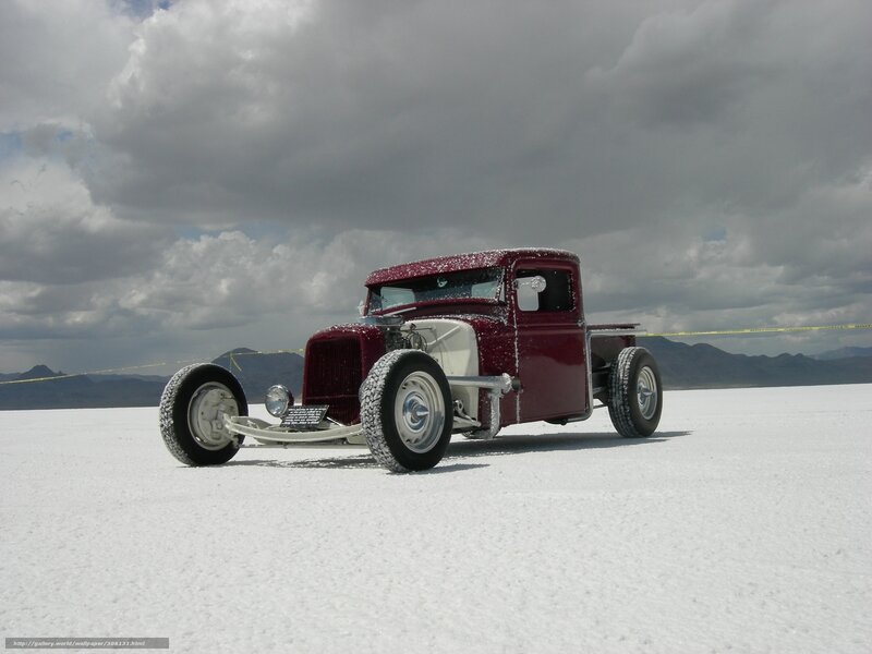 Red hot rod truck on salt flat