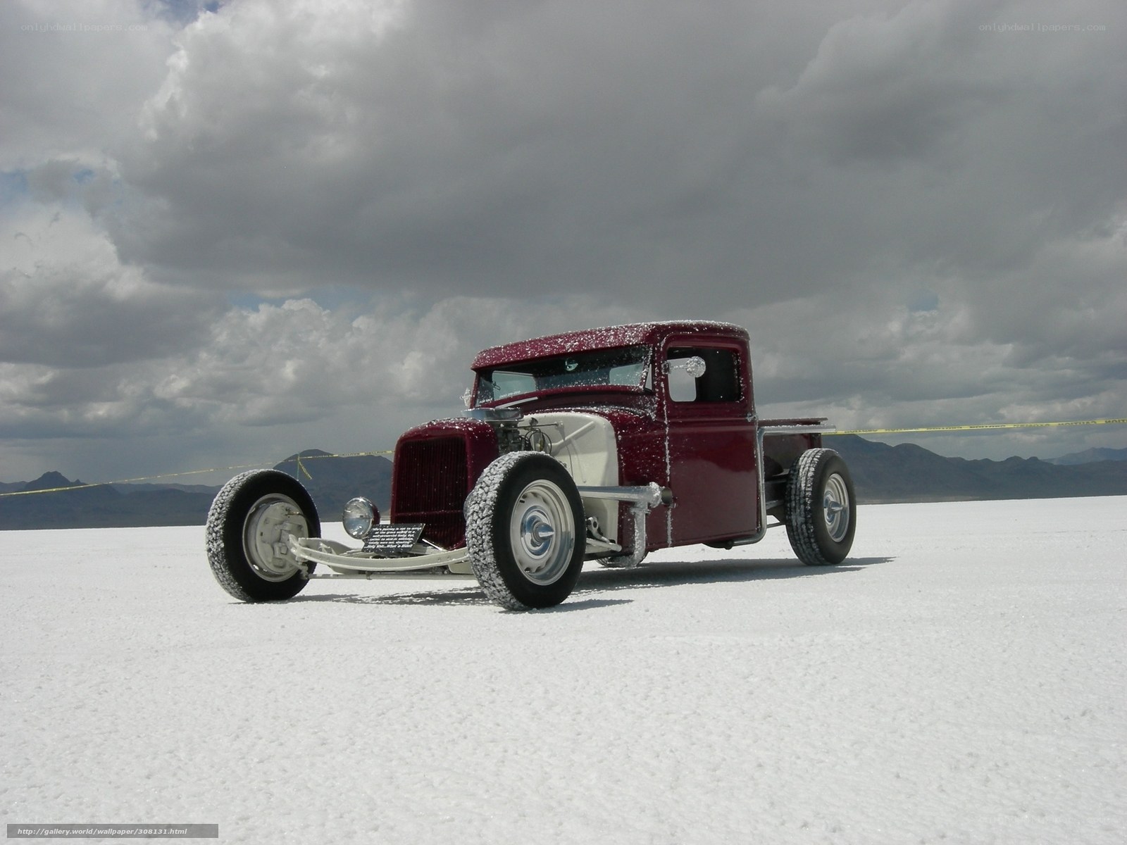 Red hot rod truck on salt flat