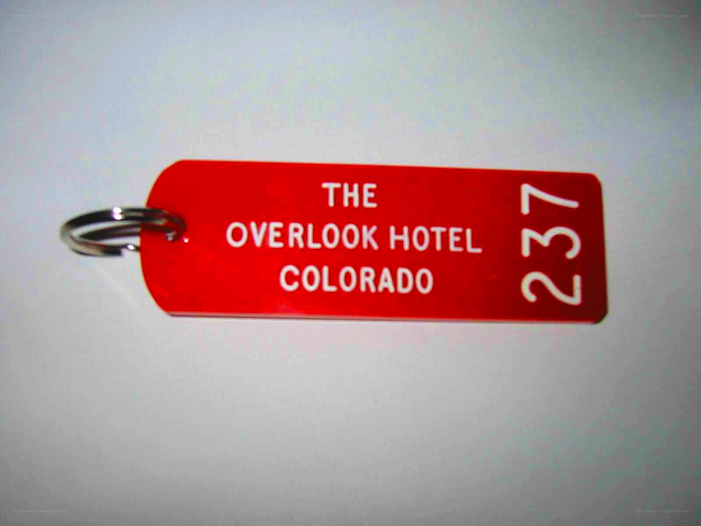 red hotel key tag